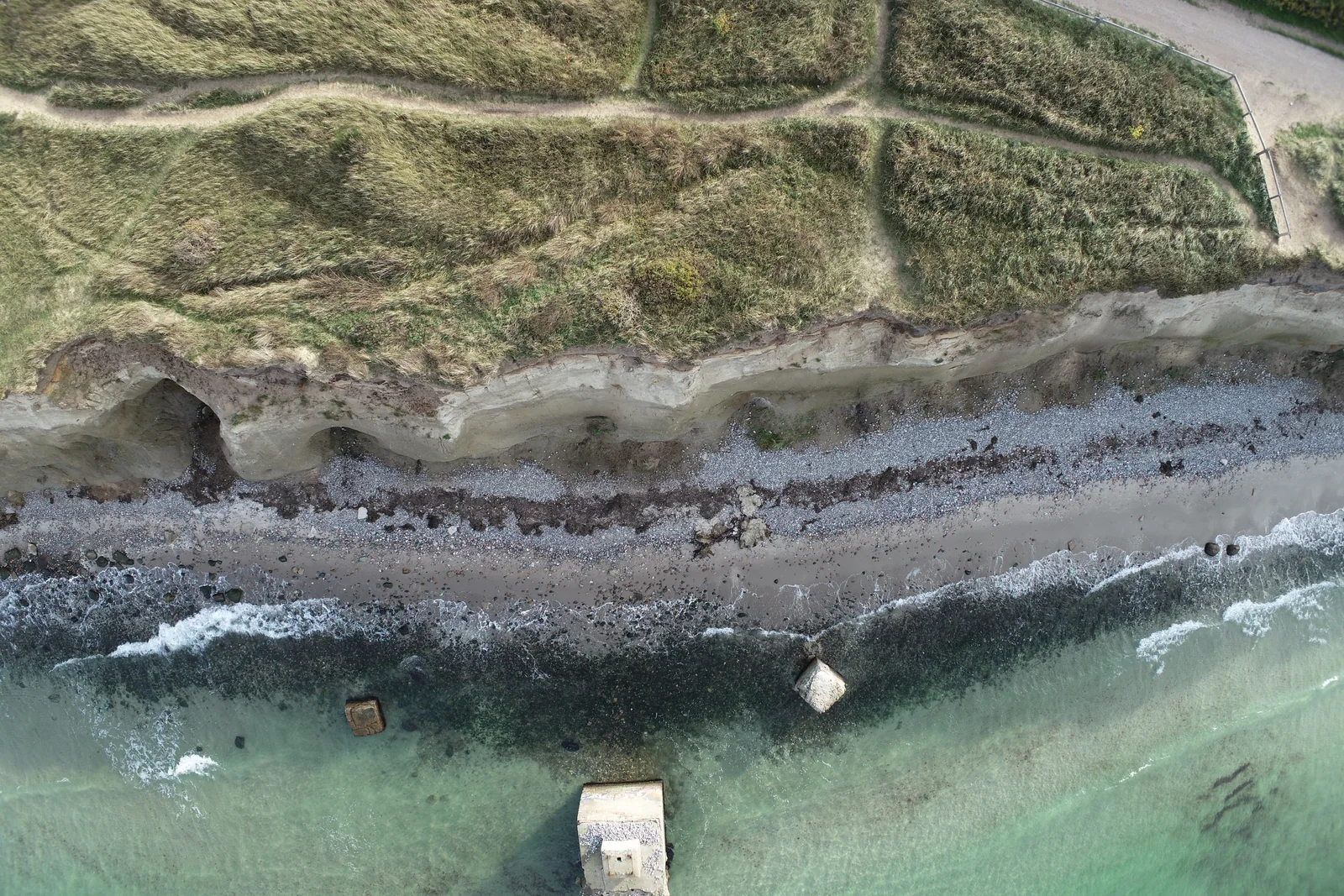 One frame from the flight, looking down on scrub and footpaths.